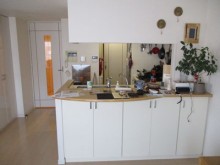 L型キッチンから2列配置の対面キッチンに